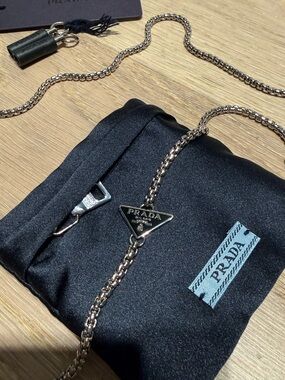100% authentic Prada AirPod necklace chain with AirPod not included brand new